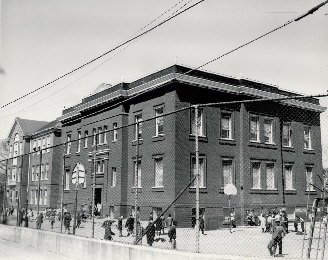 Bruce School and children in its playground around 1960